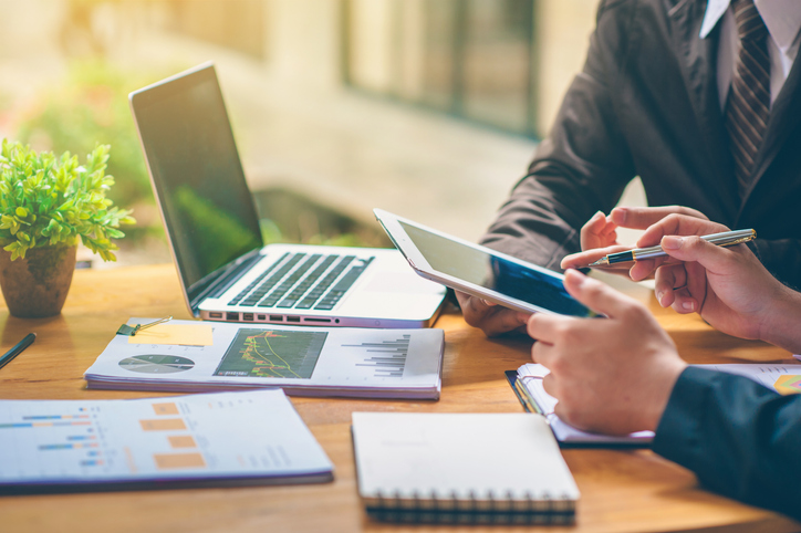 Business people are analyzing and planning business. Business Strategy Consulting Business people are analyzing and planning business. Business Strategy Consulting